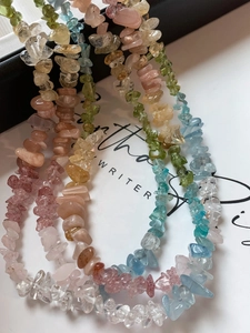 Macro shot of colorful irregular natural gemstone beads for handmade necklaces and bracelets