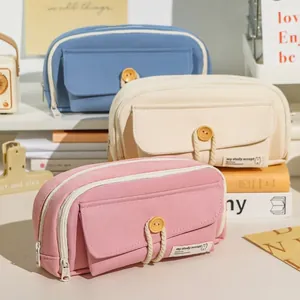 Large capacity canvas pencil case with side zipper and button closure in pastel colors