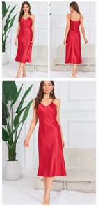 Detail of red silk-like satin midi slip dress with V-neck and delicate straps
