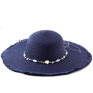 Navy blue wide brim straw sun hat with bohemian seashell and starfish beaded decoration