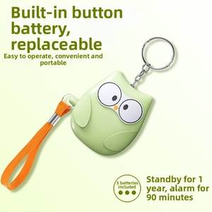 Detail of owl alarm showing replaceable 3*LR44 batteries and 90min continuous sound