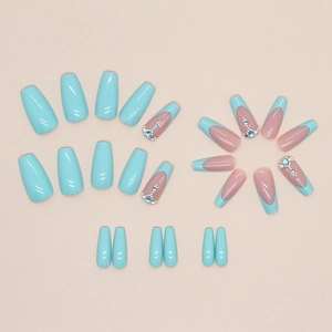 Lake blue and nude pink press-on nails with luxury rhinestones and glossy finish