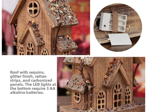 Detail of Christmas wooden LED house with gold glitter roof and battery compartment