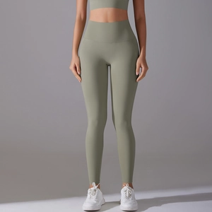 Close-up of high-waist seamless yoga leggings in sage green with tummy control compression