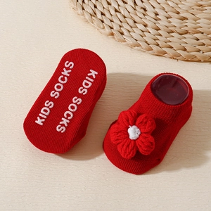 Red Christmas knit baby socks with 3D flowers and non-slip soles for toddlers