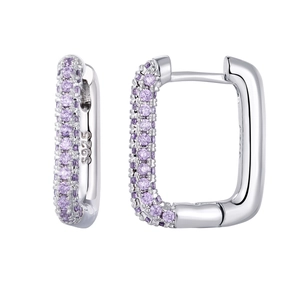 Macro detail of S925 silver earrings featuring pavé set purple zircons and secure hinge