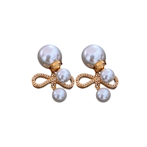 Gold plated bow pearl earrings with silver needle featuring French vintage luxury style