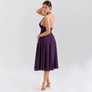 Elegant purple halter backless chiffon midi dress shown from a back view on a model