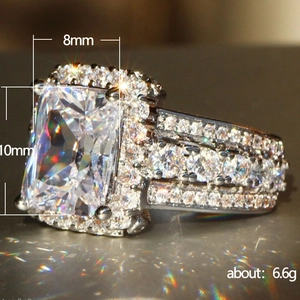 Luxury 8x10mm radiant cut cubic zirconia ring with halo setting in silver finish