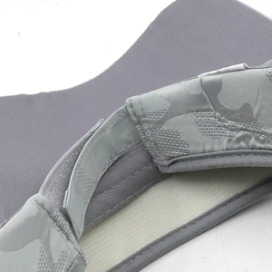 Detail of light grey camouflage sun visor with adjustable hook-and-loop strap and breathable mesh