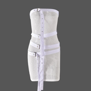 Close-up of white tube dress featuring mesh fabric and metal buckle belt details
