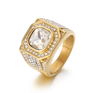 Iced out gold octagon ring for men with cubic zirconia stones on white background