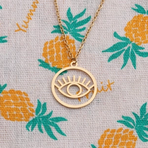 Minimalist gold stainless steel evil eye pendant necklace with hollow circular design
