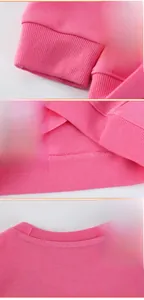 Detailansicht des rosa Mädchen-Sweatshirts mit gerippten Bündchen und feinen Nähten