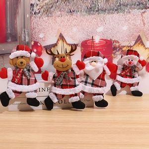Set of four Christmas plush dolls with red and black plaid design for holiday decoration