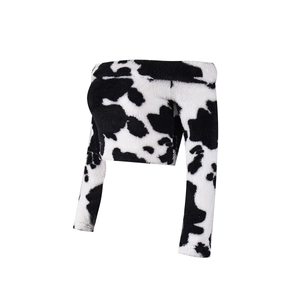 Detailed view of the fuzzy cow print texture on this off-shoulder cropped long sleeve top
