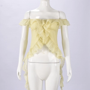 Detail of yellow off-shoulder top featuring layered ruffles and flared sleeve design