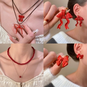 Vintage red beaded necklace set with bow pendant and matching earrings for women