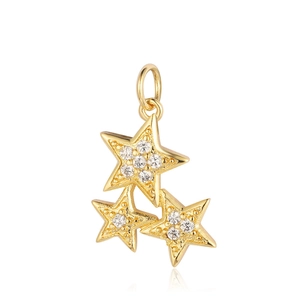 Detail view of gold-plated triple star pendant set with shimmering cubic zirconia stones