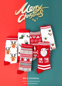 Detailed set of 6 knitted Christmas socks featuring reindeer, snowflake and santa patterns