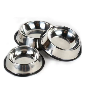 Macro view of stainless steel pet bowls featuring a black anti-slip rubber base