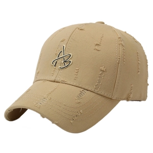 Distressed khaki baseball cap with vintage frayed holes and embroidered B letter