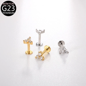 ASTM F136 G23 titanium labret studs with three-stone zircon cluster design in gold and silver
