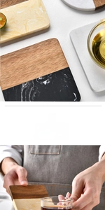 Detailed close-up showing heat-resistant marble and acacia wood coaster texture
