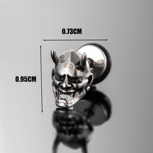 Detailed macro view of vintage Hannya mask stud earring with 0.95cm height dimension