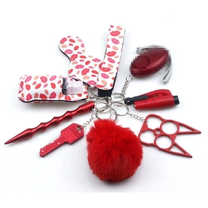Macro detail of red lipstick print lanyard and keychain accessories for security kits