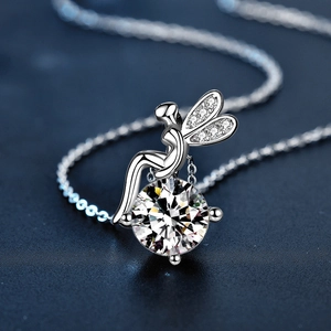 925 silver fairy necklace with a large round moissanite pendant on a blue background