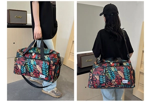Macro detail of leaf pattern travel tote featuring wet dry separation and shoulder strap