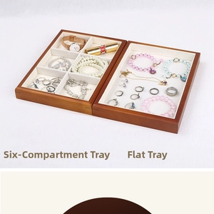 Detail view of solid wood jewelry trays with microfiber lining for rings and watches