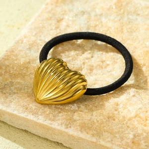 Golden heart-shaped shell textured metal charm on a black high-elastic hair tie ring
