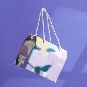 Creative floral ceramic mug gift box with purple gradient pattern and woven handle