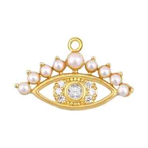 Macro detail of gold plated zircon evil eye pendant with pearl top for jewelry making