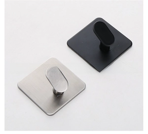 Macro shot of 304 stainless steel adhesive hooks in matte black and brushed silver finishes