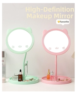 Pastel pink and mint green cat-shaped makeup mirrors with convenient storage trays