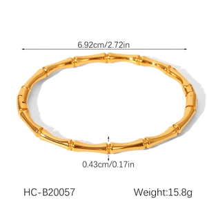 Polished 18K gold-plated stainless steel bangle with dimensions 6.92cm diameter and 15.8g weight