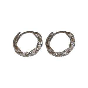 Silver twisted rope huggie hoop earrings featuring inlaid sparkling cubic zirconia stones