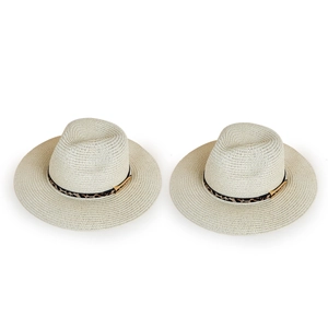 Straw sun hats with leopard print bands and gold buckles in a minimalist cream color