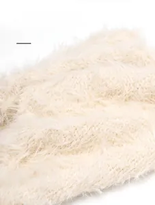 Close-up of the plush faux fur lining in off-white for cozy winter hat warmth