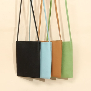 Slim soft leather crossbody phone bags in black, light blue, brown and light green colors