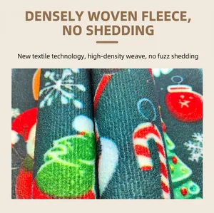 Christmas non-slip welcome mat with festive tree and snowflake patterns on blue flannel