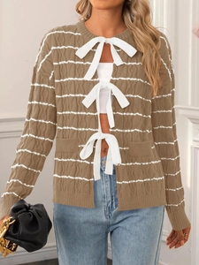 Women's striped knit cardigan with three white bow ties and long sleeves in brown