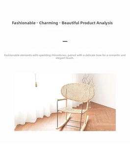 Modern minimalist rattan rocking chair with black metal frame in a bright Nordic interior