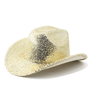 Detail of a sparkling gold sequin cowboy hat with metallic reflective surface and wide brim