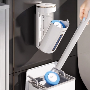Wall-mounted disposable toilet brush with white holder and blue sponge replacement heads