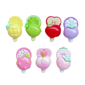Assorted fruit resin charms featuring strawberry, apple, and lime for DIY hair clips