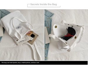 Détails d'un sac cabas en velours côtelé blanc montrant le rangement et le fermoir
